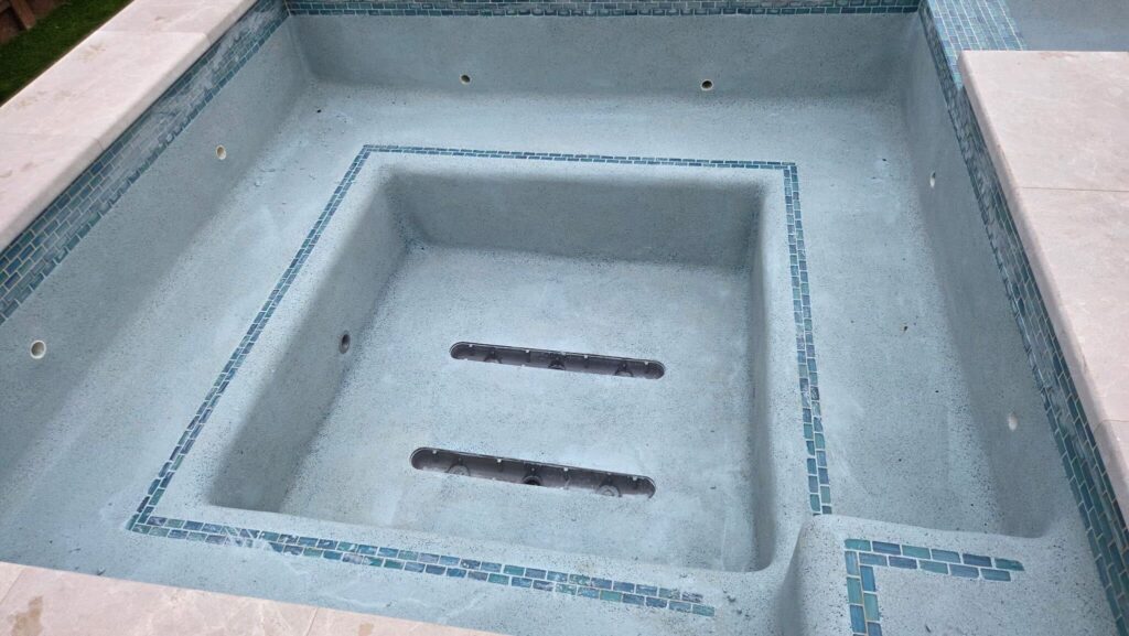 Spa after pebble resurfacing.